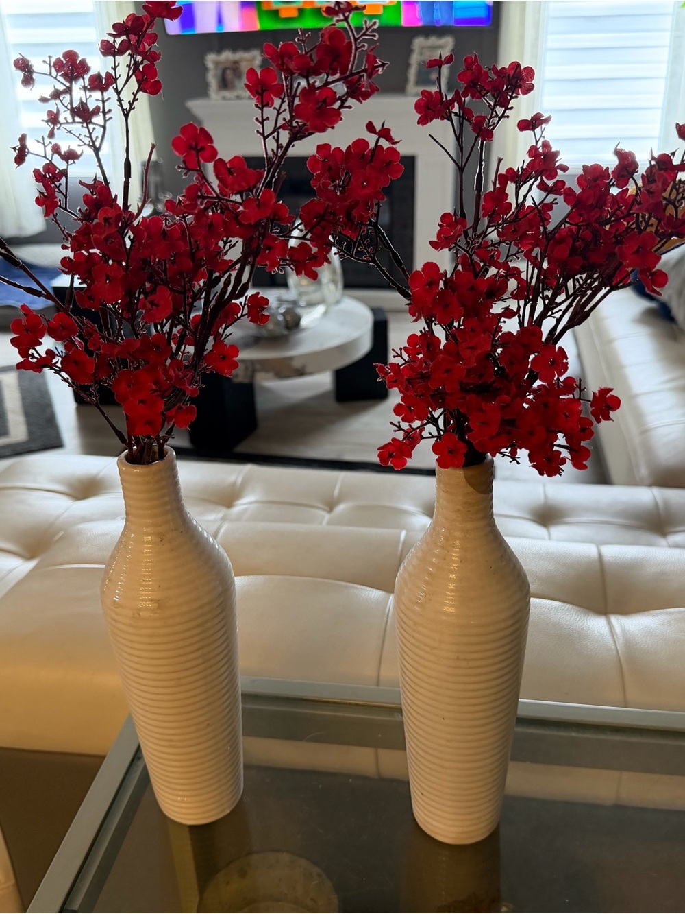 White Ribbed Ceramic Vase with Red Artificial Blossom Arrangement